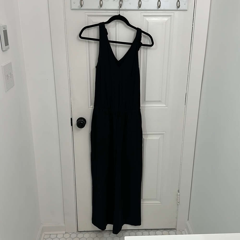 Black loft jumpsuit with ruffle back tank